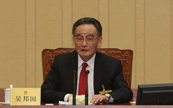 Wu Bangguo, chairman of the Standing Committee of the National People's Congress (NPC), presides over a meeting of the 30th session of the 11th NPC standing committee at the Great Hall of the People in Beijing, capital of China, Dec. 28, 2012. The 30th session of the 11th NPC Standing Committee concluded after finishing all its agendas on Friday. [Fan Rujun/Xinhua]