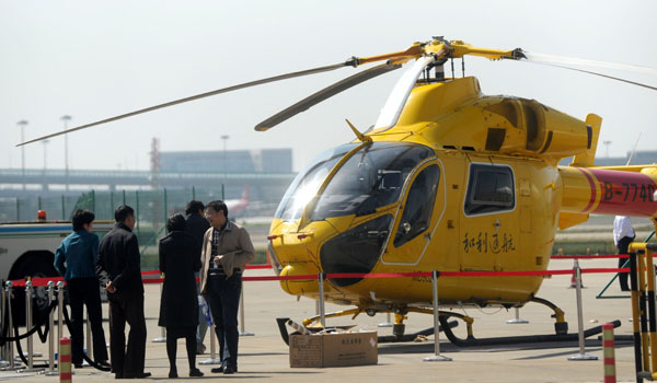 A commercial helicopter parked at Shanghai Hongqiao International Airport in April 2011. China has become one of the largest potential aviation markets globally. [Niu Yixin / for China Daily]