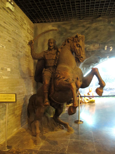 A Xianbei warrior on horseback guards the entrance to Shengle museum, which honors the Xianbei ethnic group. Wang Kaihao / China Daily