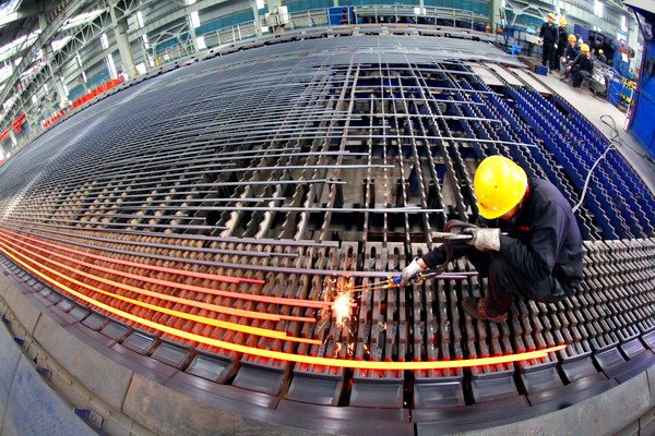 A steel bar factory in Ganyu county, Jiangsu province. In the first 11 months of 2012, China's 80 major steel makers posted a loss of 1.97 billion yuan ($316 million), according to the China Iron and Steel Association. [Photo / China Daily] 