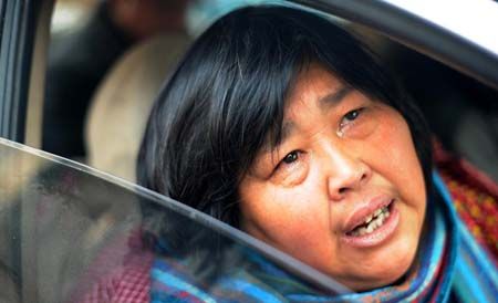 On the morning of Jan. 4, 2013, a fire broke out in Yuan Lihai's two-storey home while she was taking some of the older children to school. Seven people, including six children aged 7 months to 5 years and one 20-year-old man, died in the fire.[File photo]