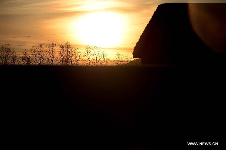 Photo taken on Jan. 8, 2013 shows the beautiful scenery of Qagan Gol Town in Qinghe County, northwest China's Xinjiang Uygur Autonomous Region.