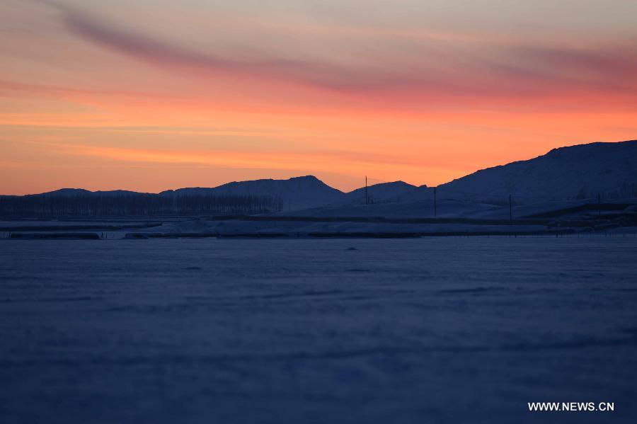 Photo taken on Jan. 8, 2013 shows the beautiful scenery of Qagan Gol Town in Qinghe County, northwest China's Xinjiang Uygur Autonomous Region.