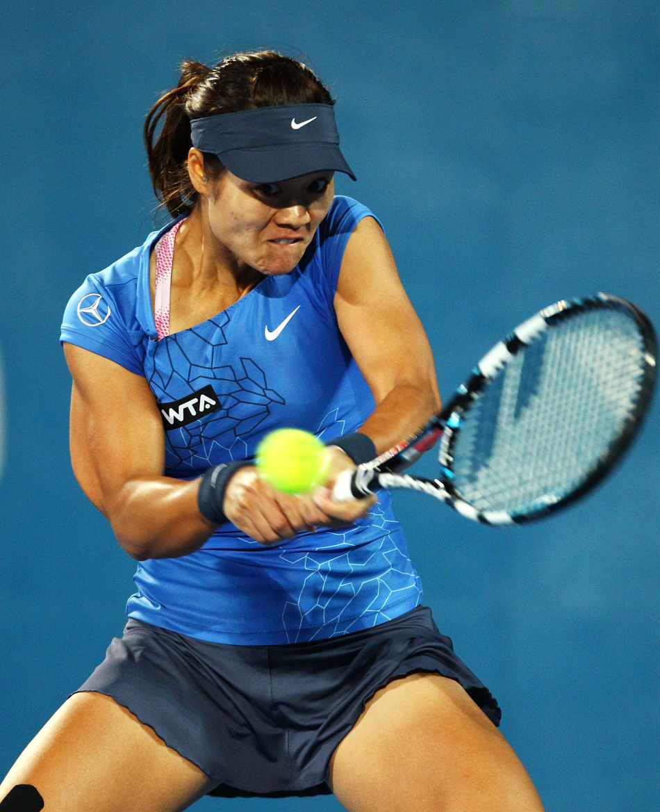 Li Na of China returns a ball to Madison Keys of USA in the quarterfinals of Sydney International on Jan. 9, 2013.