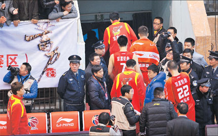 Qingdao Eagles players stage a walkout to protest a bad call during their CBA game against the Bayi Rockets in Ningbo, Zhejiang Province, on Wednesday.  