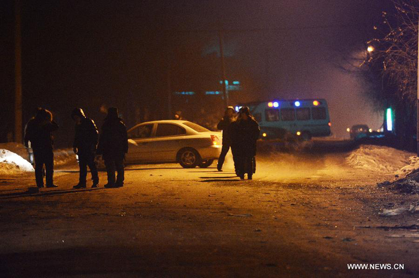 Photo taken on Jan. 11, 2013 shows the site where a blast occurred in Shuangyashan City, northeast China&apos;s Heilongjiang Province. Seven people were killed and 39 others injured after a commuter-van exploded in Shuangyashan on Friday, local authorities said. The commuter-van from a mine company in Shuangyashan City exploded around 6:30 a.m. in the district of Lingdong, a city government spokesman said at a press conference in the afternoon. An investigation into the cause of the accident is under way. 