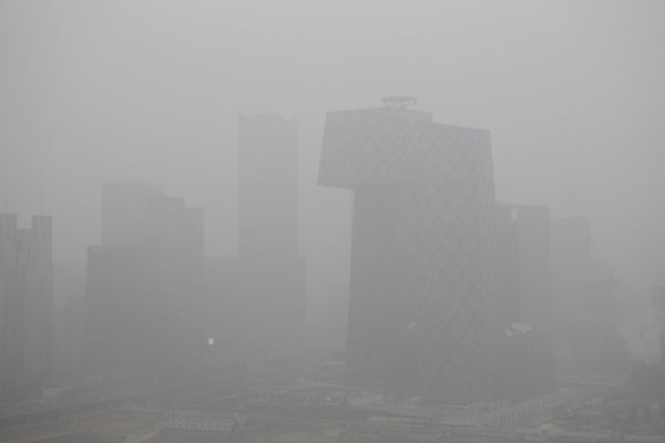 Beijing moves to curb prolonged haze pollution