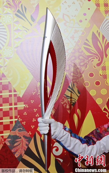  Sochi unveils winter Olympic torch.