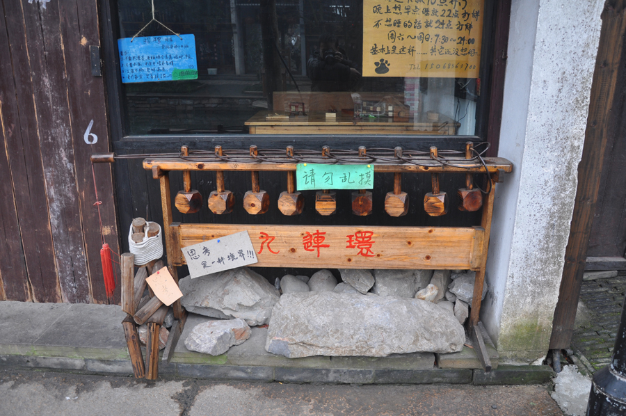 Zhouzhuang, a famous water town in southern China, is located in Kunshan City, Jiangsu Province. Because Zhouzhuang is surrounded by water, boats were necessary for entering and departing from Zhouzhuang before the 1980s. 