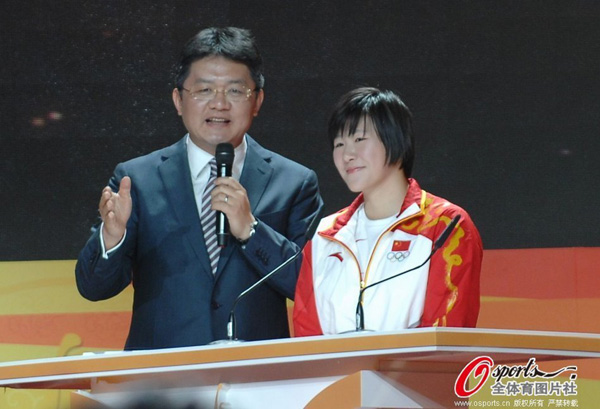 Ye Shiwen (R) attends the ceremony announcing the nominnees of  this year's CCTV Sports Personality of the Year award in Beijing on Dec. 20, 2012.  