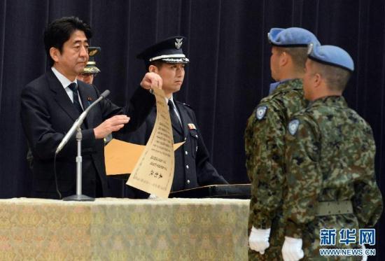 File photo - Japanese Prime Minister Shinzo Abe has announced that Japan will modify its National Defense Program Guidelines and initiate a midterm defense program, to bolster the country's defensive capabilities.