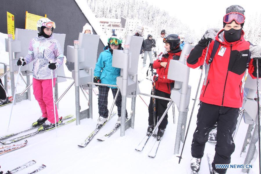 Skiers prepares for skiing at Mountain Jahorina near Sarajevo, Bosnia-Herzegovina, on Jan. 19, 2013.