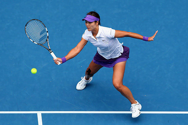 Li Na returns a ball to Agnieszka Radwanska in women's quarterfinals of Australian Open at Rod Laver Arena on Jan. 22, 2013.