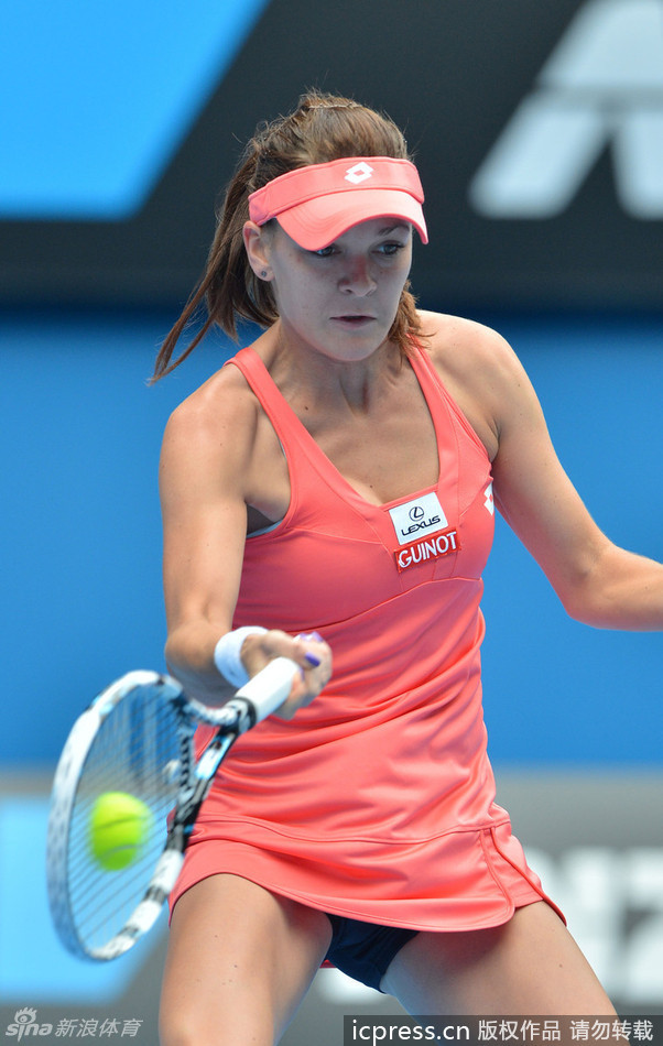 Agnieszka Radwanska of Poland returns a ball to Li Na of China in women's quarterfinals of Australian Open at Rod Laver Arena on Jan.22, 2013.