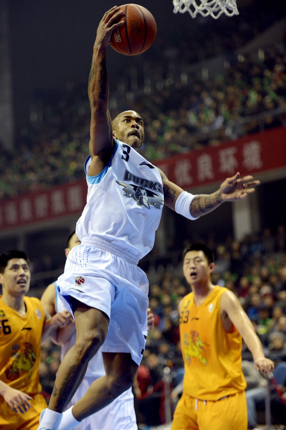 Stephone Marbury of Beijing goes up for a basket in a CBA game between Beijing and Shanxi on Jan.23, 2013.
