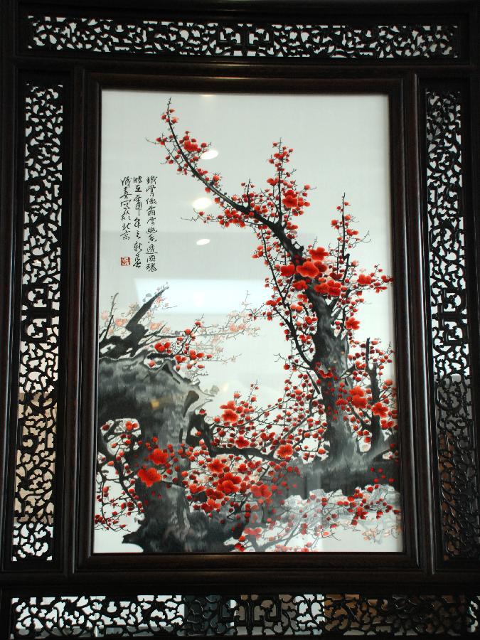 Photo taken on Jan. 23, 2013 shows an embroidery work at China Plum Blossom Art Center in Nanjing, capital of east China&apos;s Jiangsu Province. The China Plum Blossom Art Center with the theme of plum blossom will be officially open to the public in February this year.