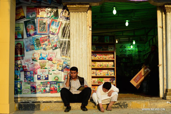 People attend the 44th Cairo International Book Fair in Cairo, Egypt, Jan. 23, 2013. 