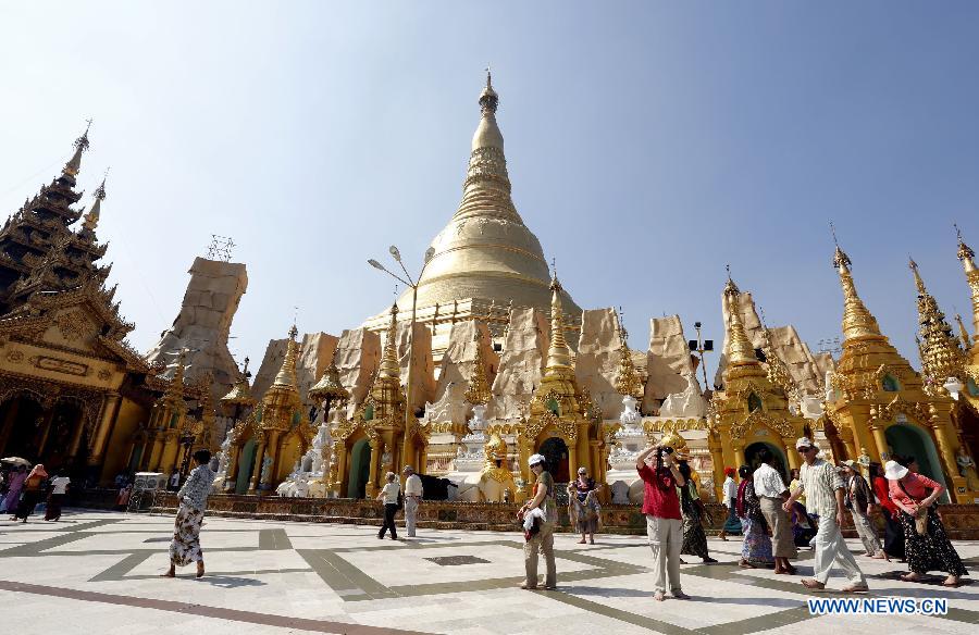 Tourists visit downtown Yangon, Myanmar, on Jan. 24, 2013. 