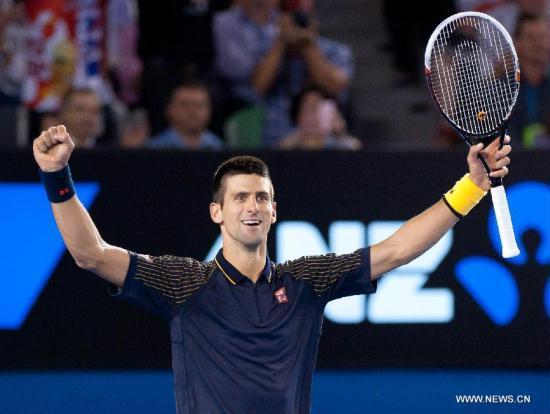 Novak Djokovic of Serbia celebrates for victory after the men's singles final against Andy Murray of Britain at the 2013 Australian Open tennis tournament in Melbourne, Australia, Jan. 27, 2013. Novak Djokovic won 3-1 to claim the champion. [Xinhua]