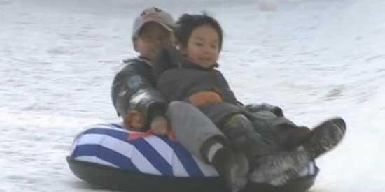 Children in Beijing get a new winter playground, after a free snow park opens up inside the capital. 