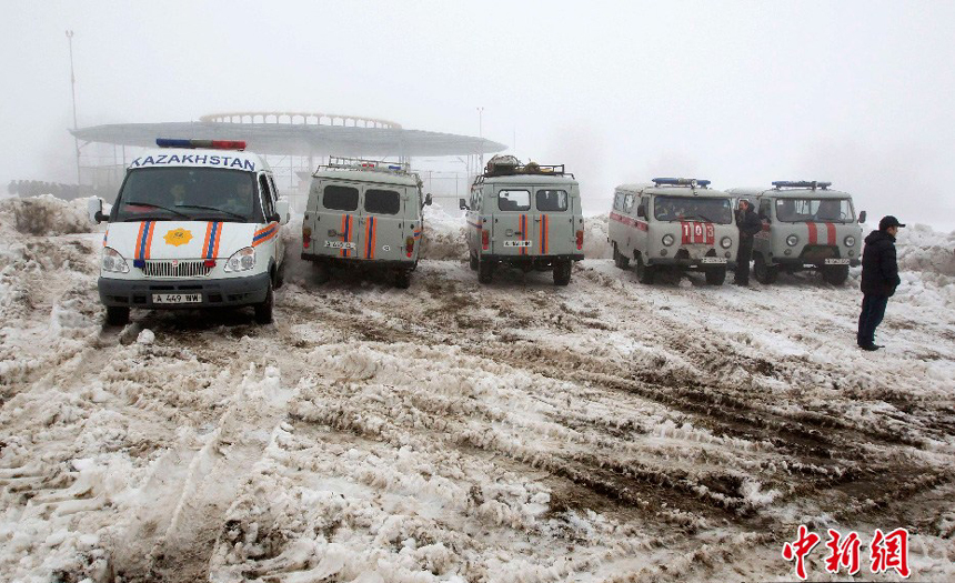 Photo taken by a witness shows people gathering at the site of the plane crash in Almaty, Kazakhstan, Jan. 29, 2013. A passenger plane flying from northern city of Kokshetau to Almaty crashed near Almaty airport Tuesday, killing all 20 people aboard.