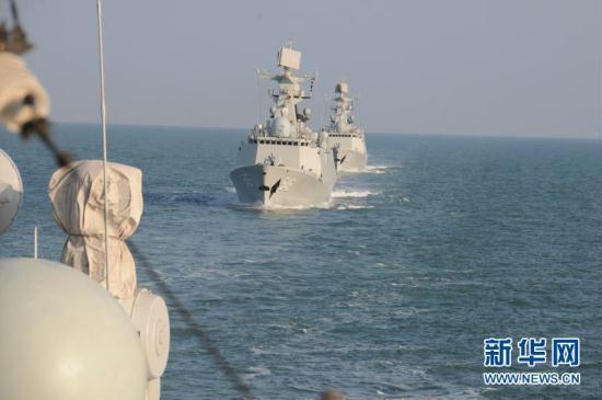 A Chinese People's Liberation Army (PLA) Navy fleet has set off from a military port in east China's Qingdao City for regular open-sea training in the West Pacific Ocean, military sources revealed Wednesday. [Xinhua]