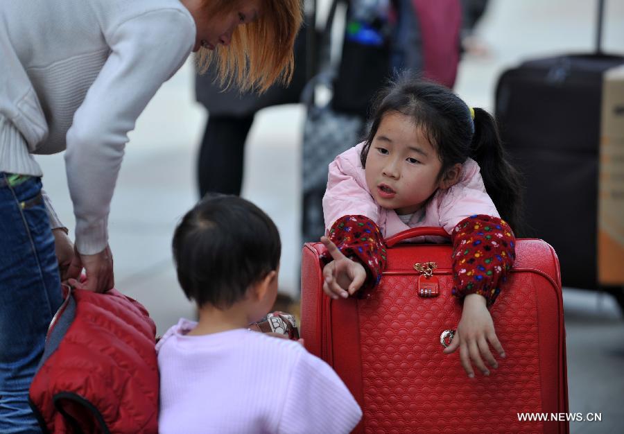 Many children travel with their families during the 40-day Spring Festival travel rush which started on Jan. 26. 