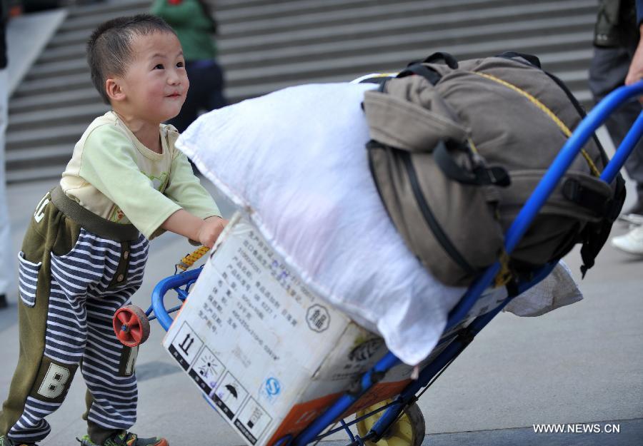 Many children travel with their families during the 40-day Spring Festival travel rush which started on Jan. 26. 