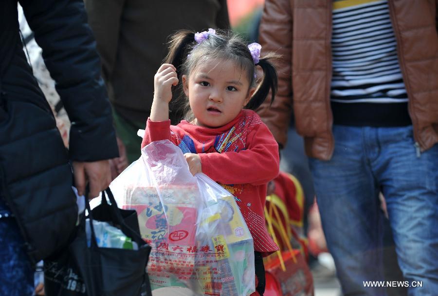 Many children travel with their families during the 40-day Spring Festival travel rush which started on Jan. 26. 