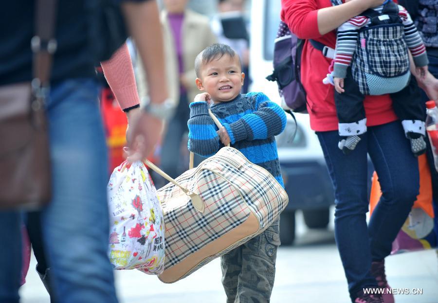 Many children travel with their families during the 40-day Spring Festival travel rush which started on Jan. 26. 