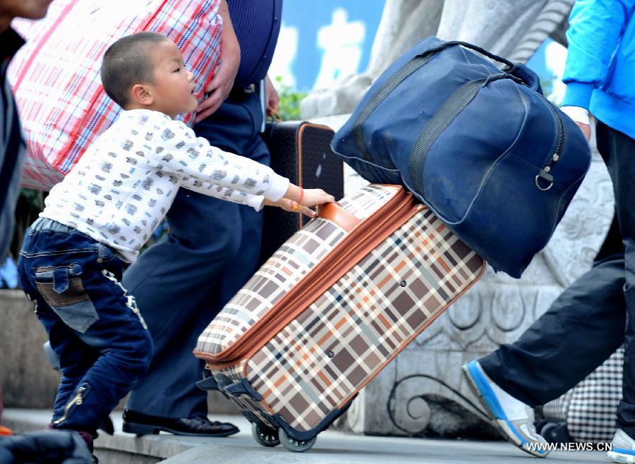 Many children travel with their families during the 40-day Spring Festival travel rush which started on Jan. 26. 