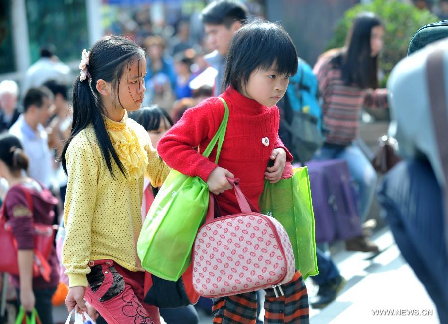 Many children travel with their families during the 40-day Spring Festival travel rush which started on Jan. 26.