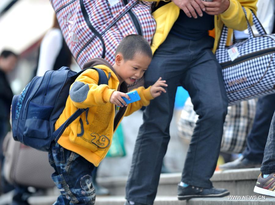 Many children travel with their families during the 40-day Spring Festival travel rush which started on Jan. 26.