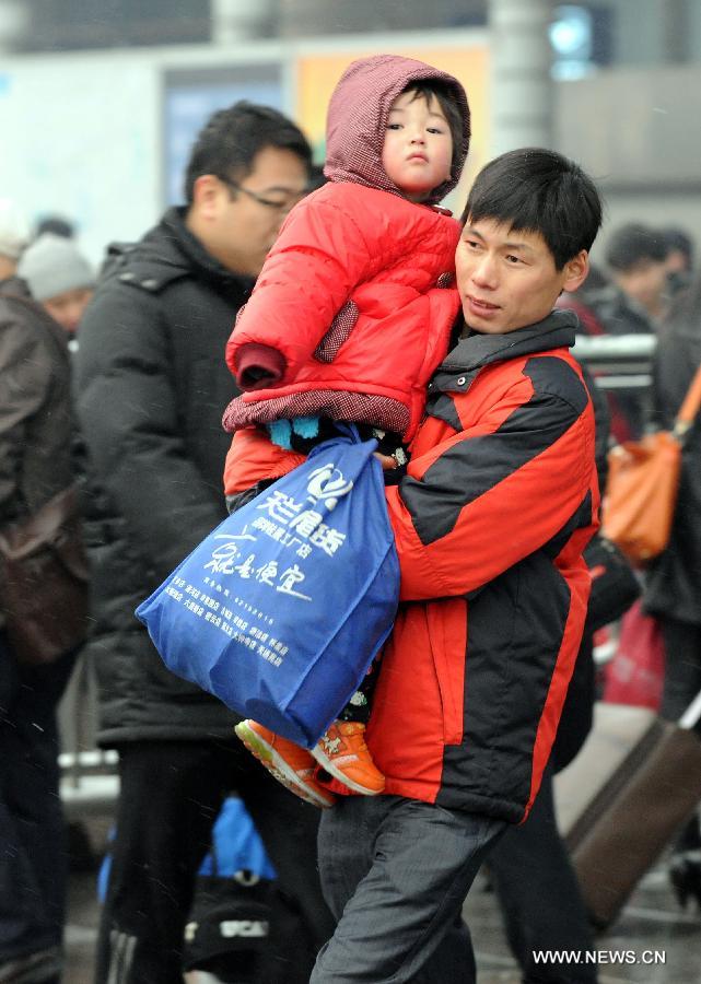 Many children travel with their families during the 40-day Spring Festival travel rush which started on Jan. 26. 