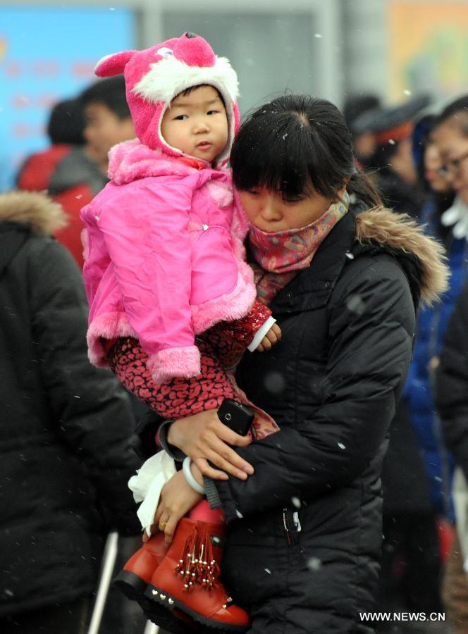 Many children travel with their families during the 40-day Spring Festival travel rush which started on Jan. 26. 