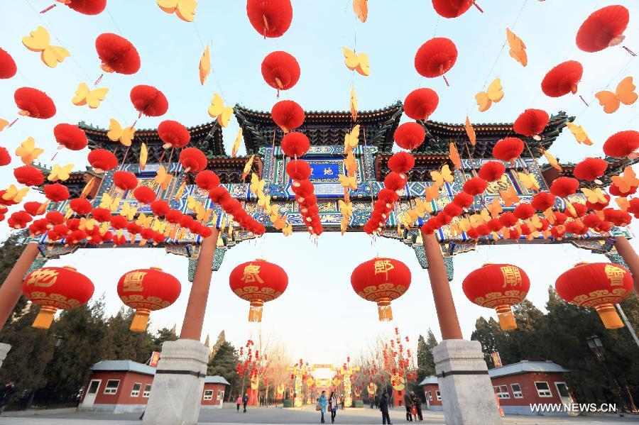 Red lanterns are hanged in the Temple of Earth Park in Beijing, capital of China, Feb. 2, 2013. 