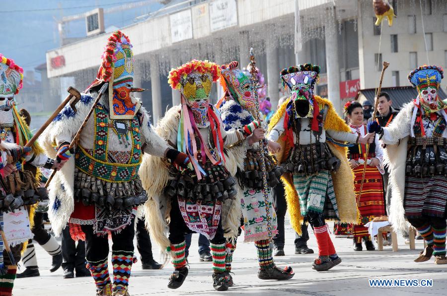 Performers parade with masks during a celebration of the International Mask Festival in Pelnik in Bulgaria, Feb. 2, 2013.