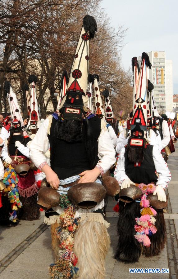 Performers parade with masks during a celebration of the International Mask Festival in Pelnik in Bulgaria, Feb. 2, 2013.