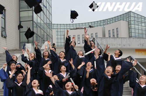 China ends free postgrad tuition.[File photo]