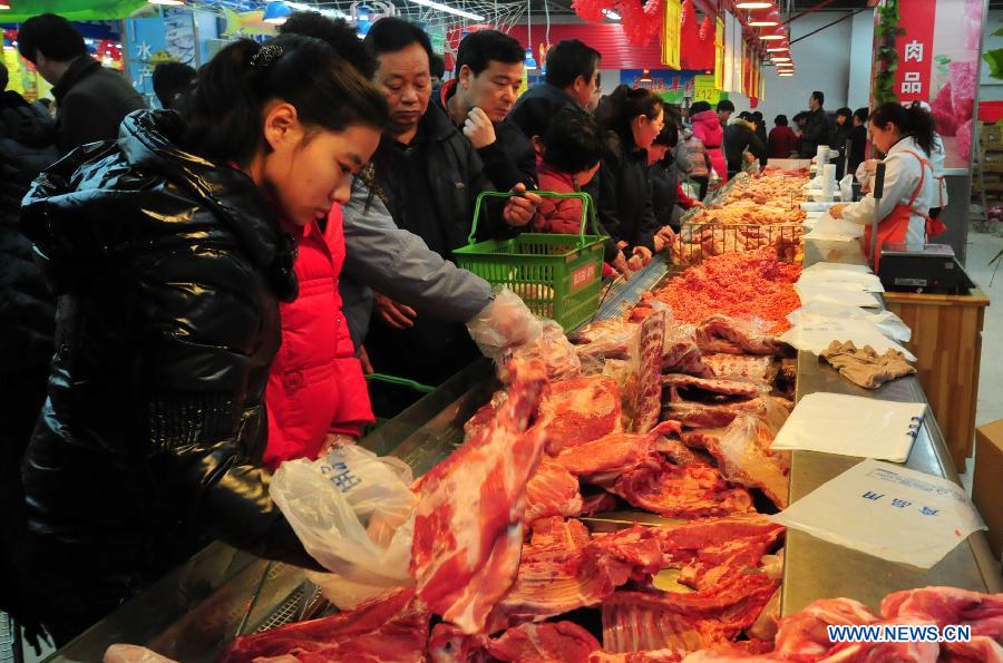 People start shopping for coming Spring Festival