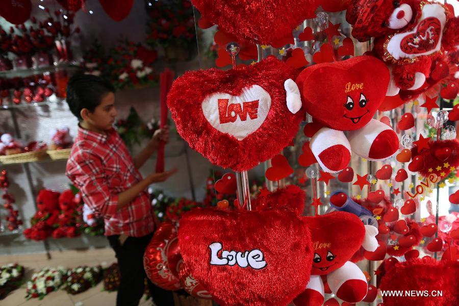 A Palestinian vendor decorates his shop on Valentine's Day in Gaza City on Feb. 14, 2013. (Xinhua/Wissam Nassar) 