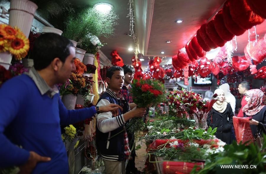 Palestinian workers prepare bouquets at a flower shop on Valentine's Day in Gaza City on Feb. 14, 2013. (Xinhua/Wissam Nassar) 