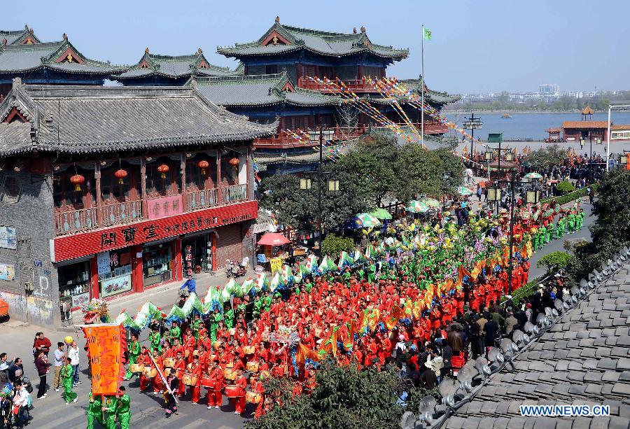 File photo taken on Feb. 27, 2010 shows a young folk artist attending a Lantern Festival Shehuo performance in Zhengzhou, capital of central China's Henan Province.