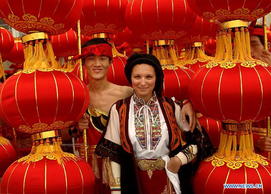 File photo taken on Feb. 27, 2010 shows a young folk artist attending a Lantern Festival Shehuo performance in Zhengzhou, capital of central China's Henan Province.