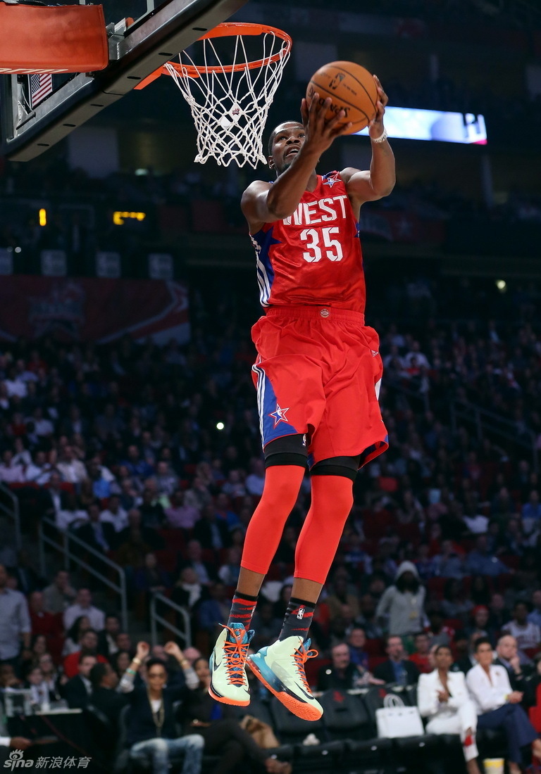 West Team's Kevin Durant of the Oklahoma City Thunder dunks during the first half of the NBA All-Star basketball game Sunday, Feb. 17, 2013, in Houston.