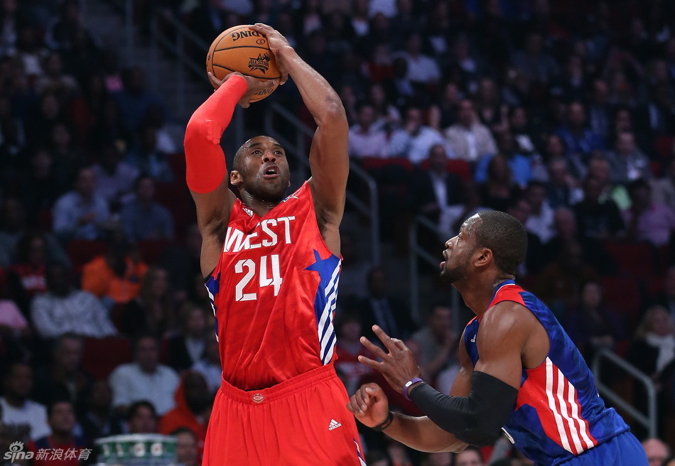 NBA All-Star Kobe Bryant of the Los Angeles Lakers shoots a jumper in front of All-Star Dwayne Wade of Miami Heat during the NBA All-Star basketball game in Houston, Texas, February 17, 2013.