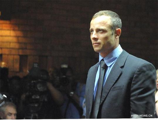 South African Olympic sprinter Oscar Pistorius appears at the Magistrate's Court to hear judgment on his bail application in Pretoria, South Africa, on Feb. 19, 2013. 