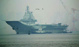 China's aircraft carrier docks at military port