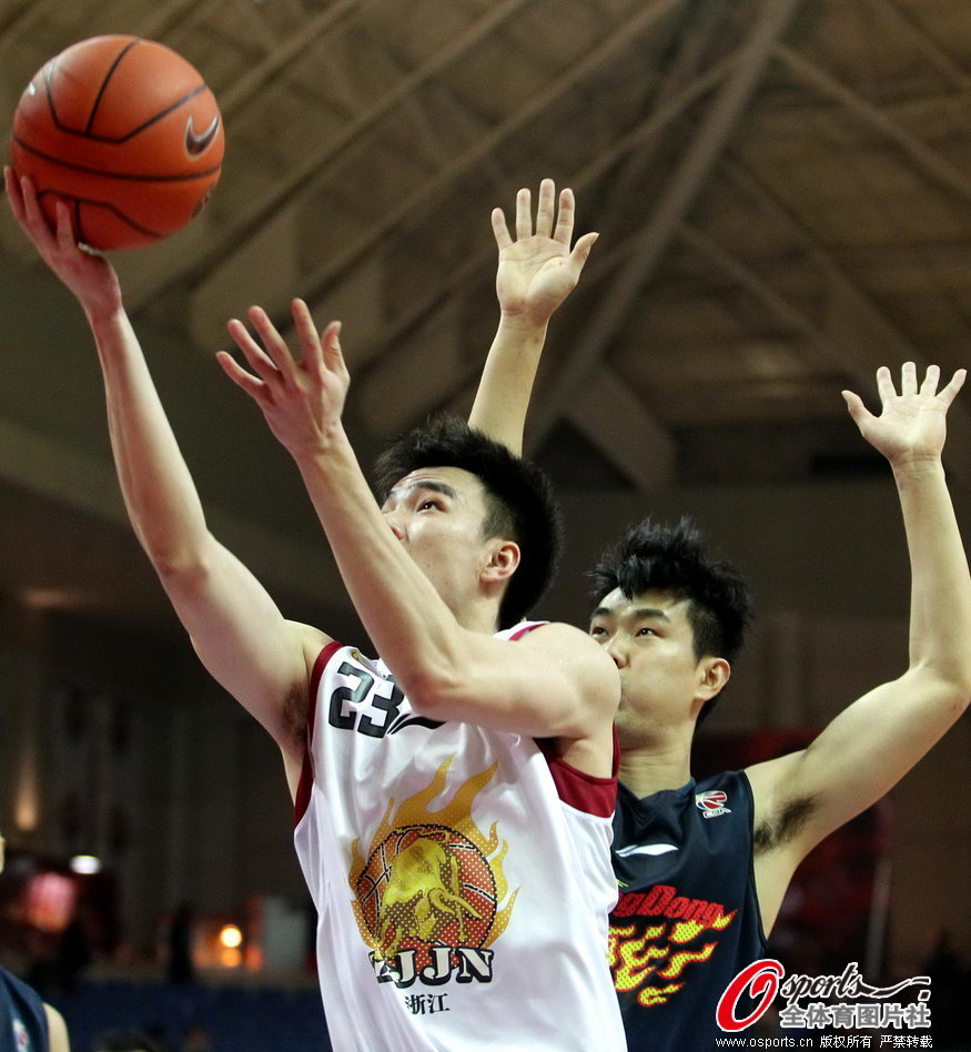 Zhejiang's Cao Fei goes up for a basket in the first round of CBA playoffs in Yiwu, Zhejiang, on Feb.27, 2013.