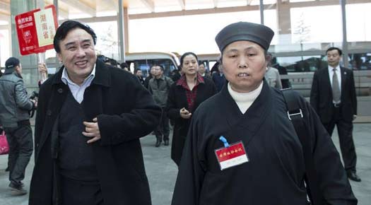 Members of 12th CPPCC National Committee arrive in Beijing